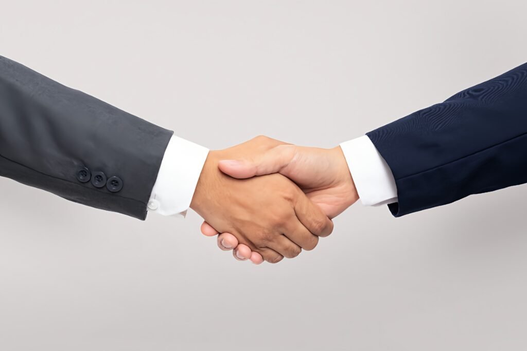 business agreement handshake hand gesture